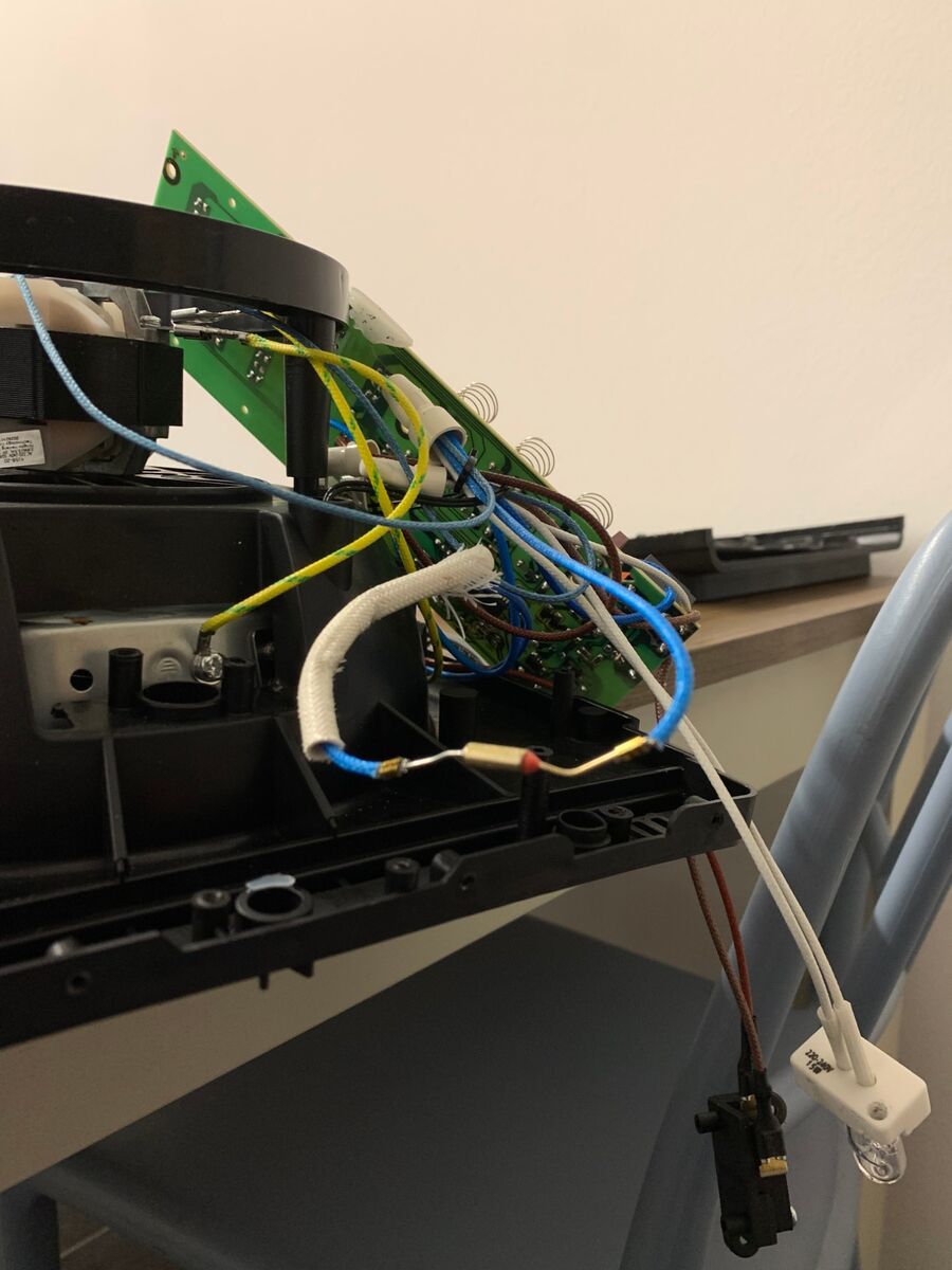 The thermal fuse in the circuit, next to the control board and the oven lamp.